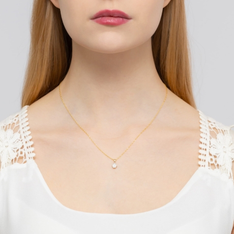 Przejdź do produktu Zawieszka z żółtego złota 585 z białym szafirem i diamentem 0,015ct The Diamonds