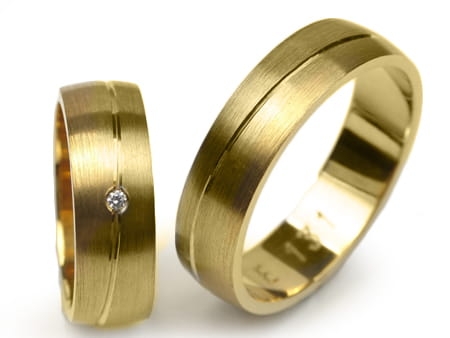 Obrączki ślubne z żółtego złota półokrągłe z cyrkonią 6mm Estetic E131